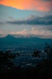 a view of a city with a mountain in the background