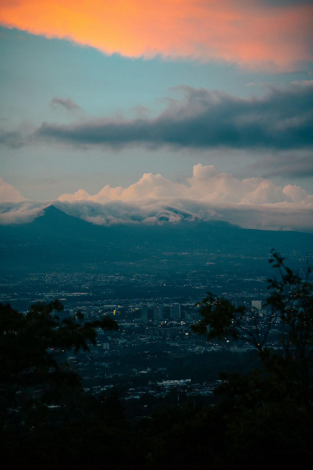 a view of a city with a mountain in the background