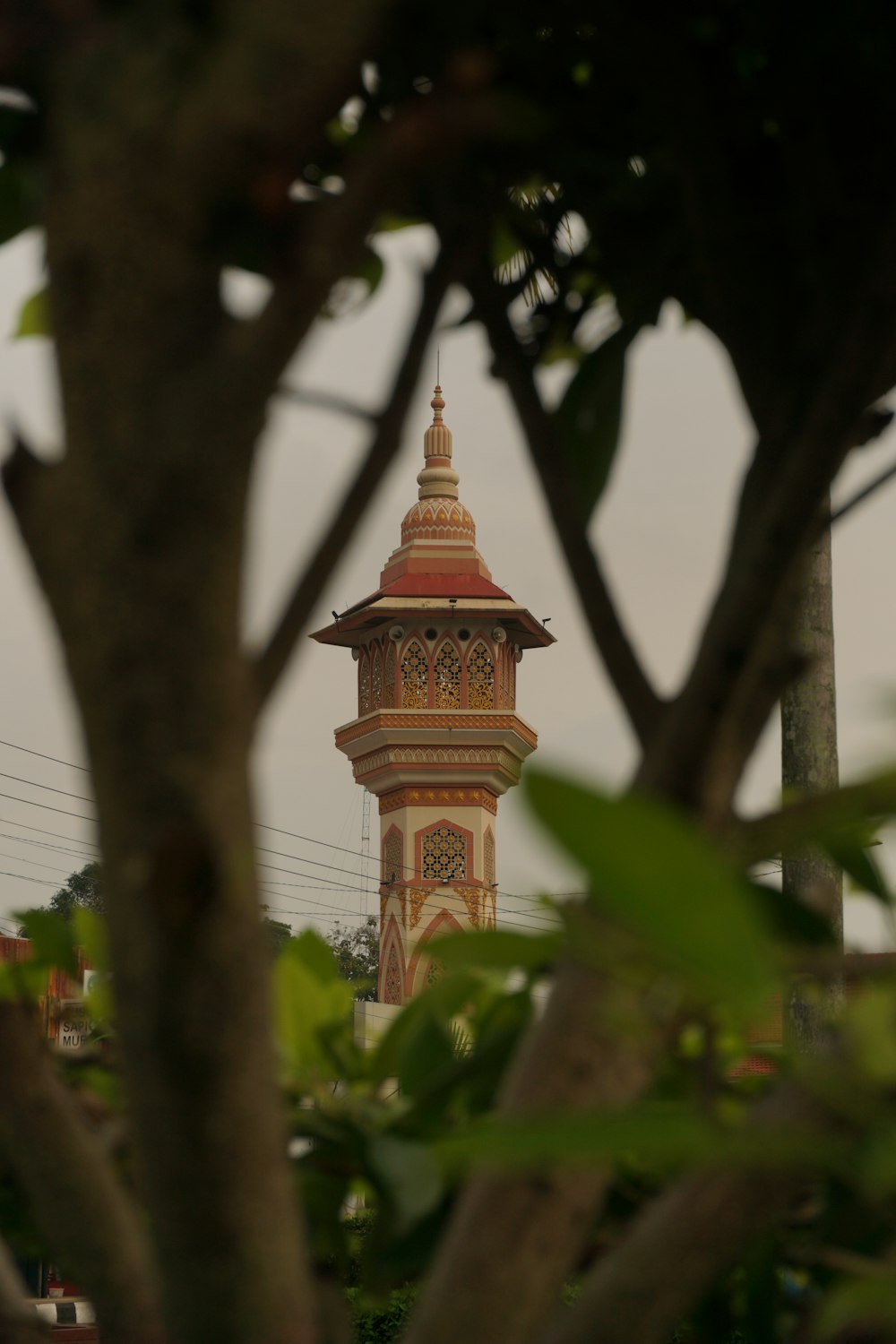 a tall tower with a clock on top of it