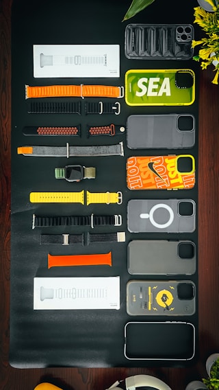 A vibrant display of mobile accessories including headphones and chargers.