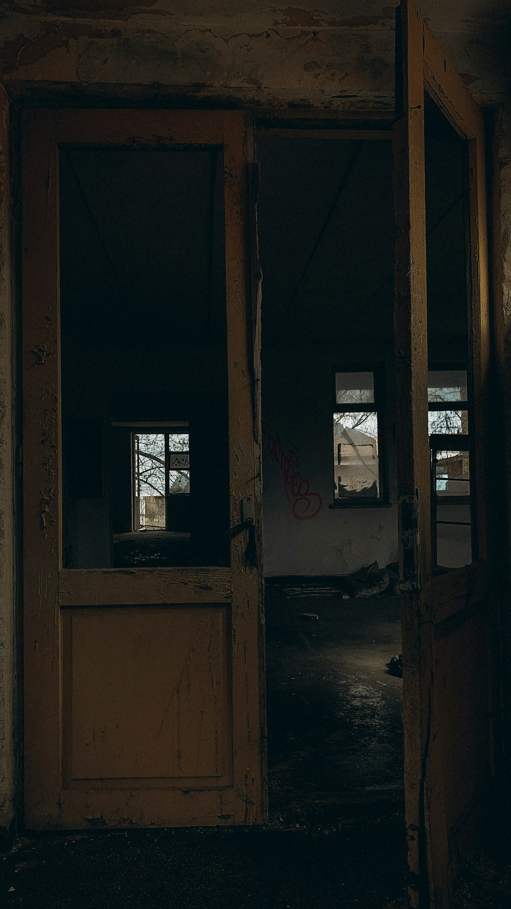 an open door in a run down building