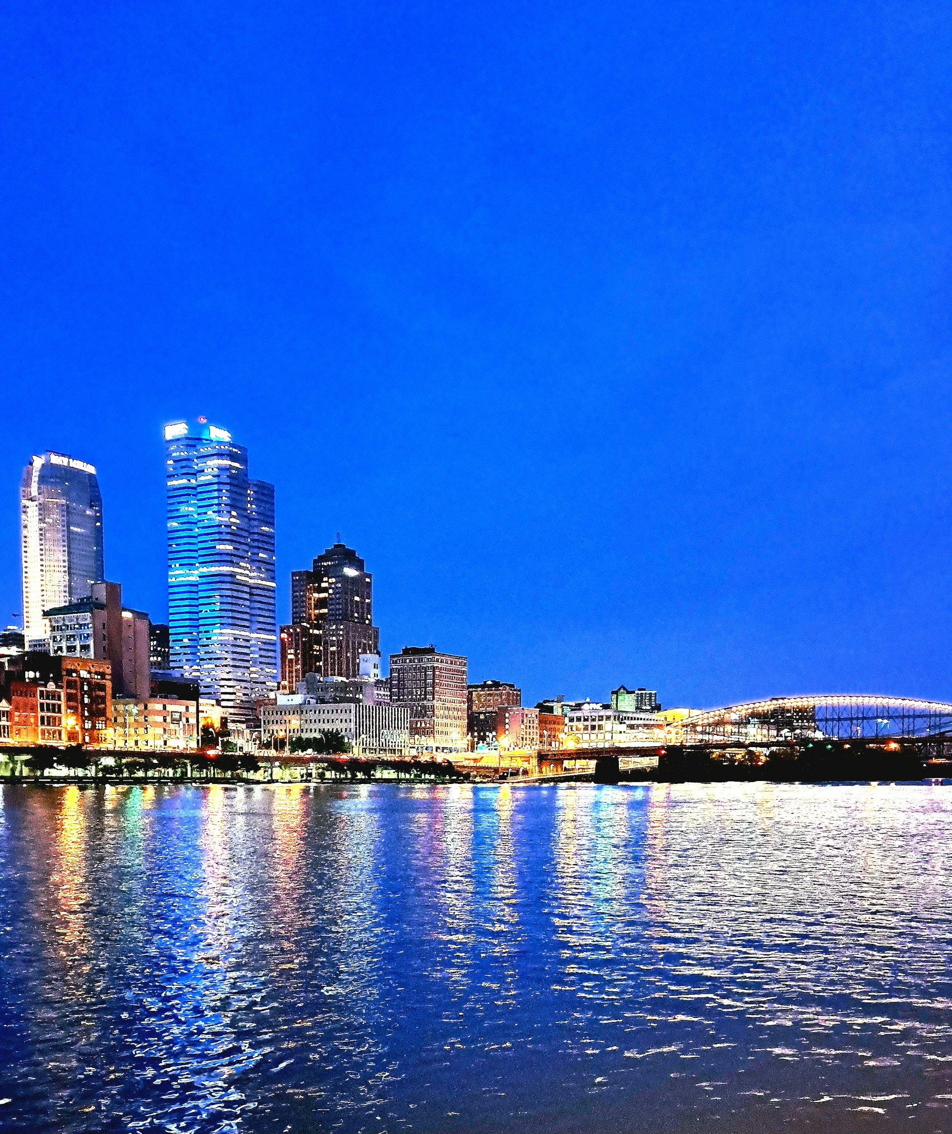 woman wearing yellow long-sleeved dress under white clouds and blue sky during daytime