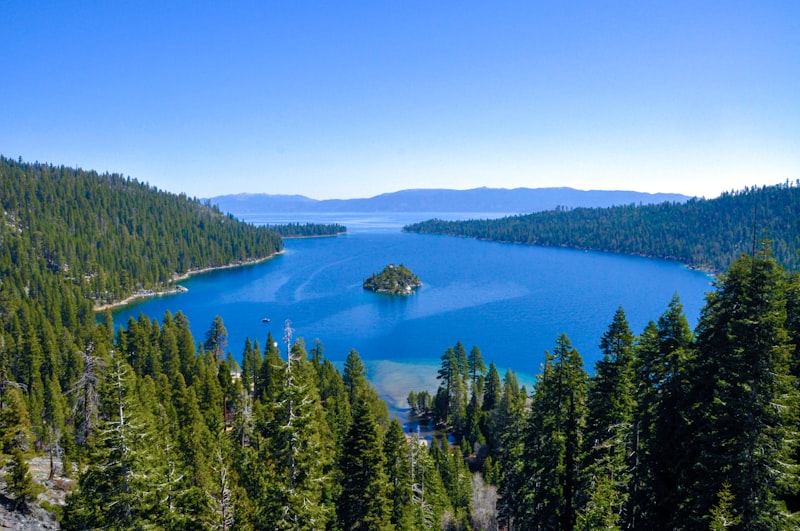 Lake Tahoe crystal clear blue water with mountains