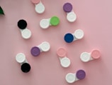 An assortment of contact lenses in various colors and styles.