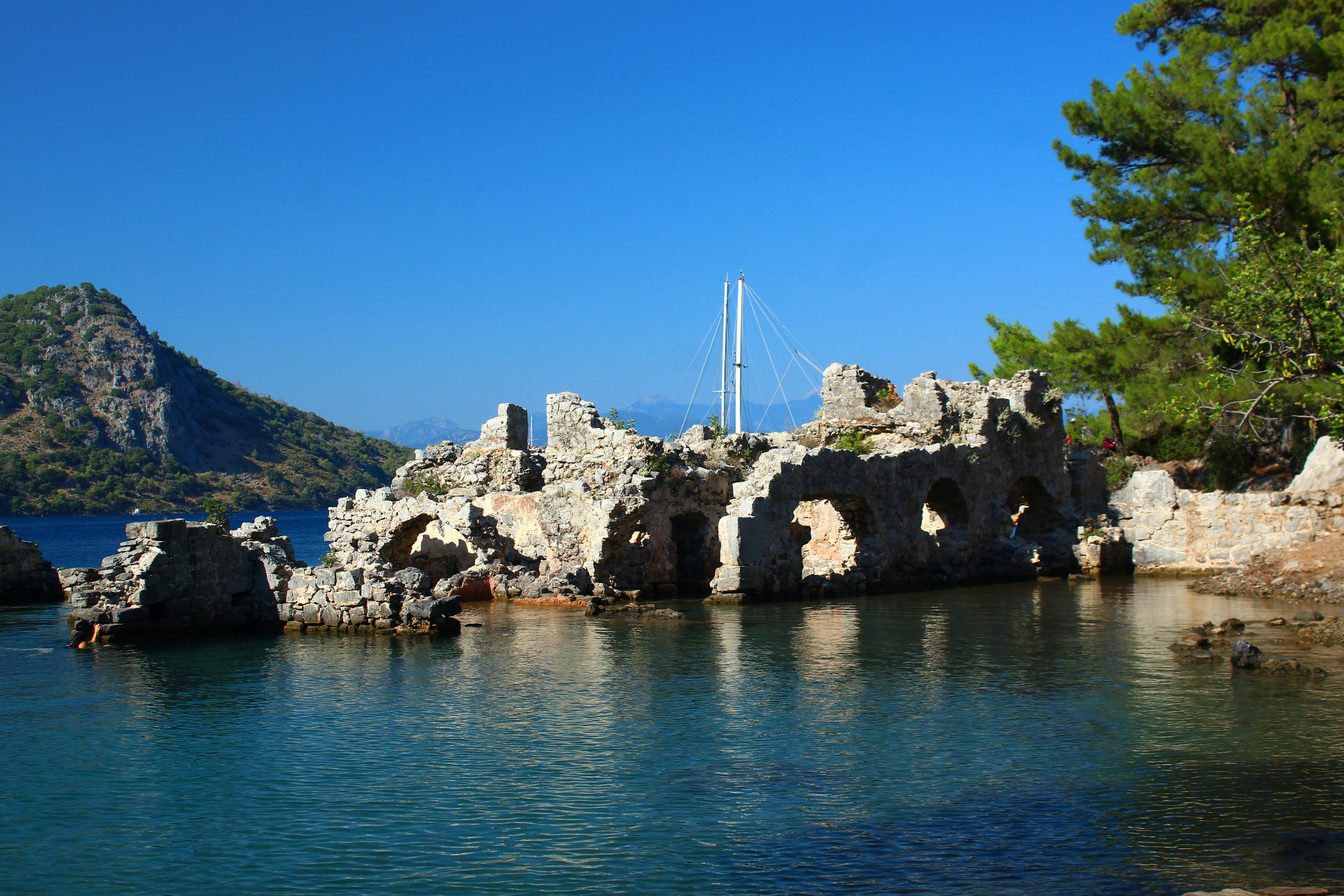 a large body of water surrounded by rocks, Cleopatra
