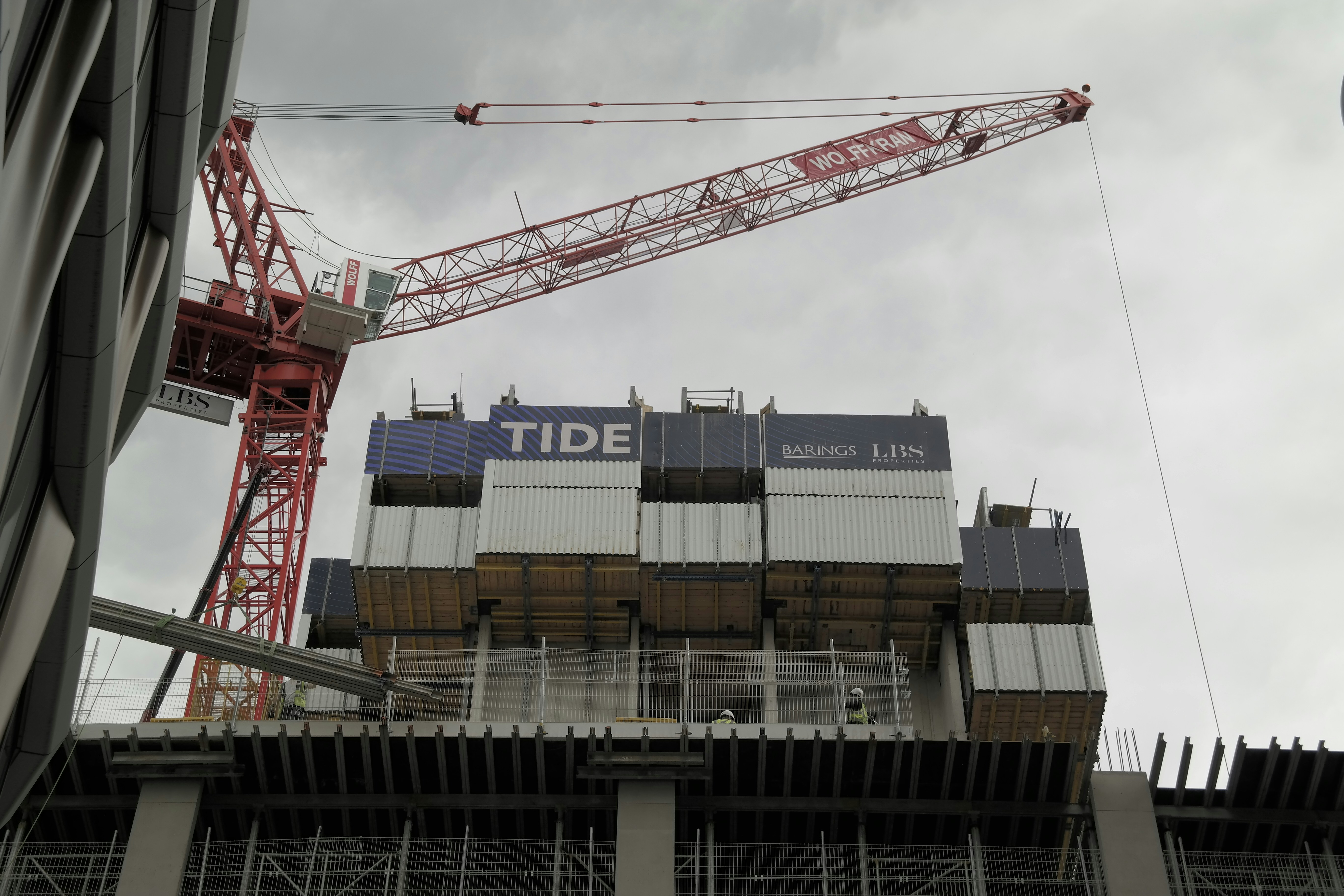 a crane that is on top of a building