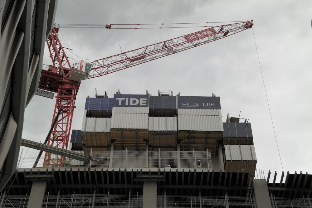 a crane that is on top of a building