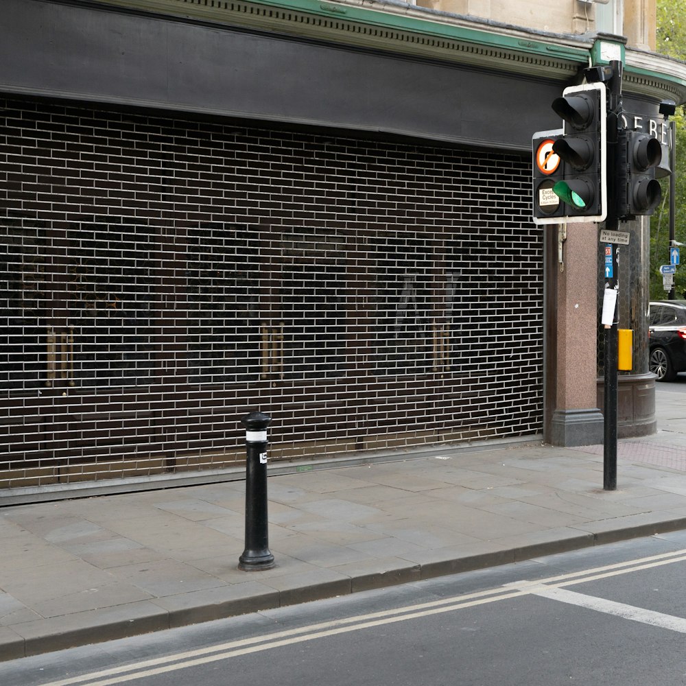 a traffic light sitting on the side of a road