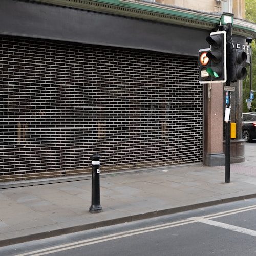 Motorised security roller shutter