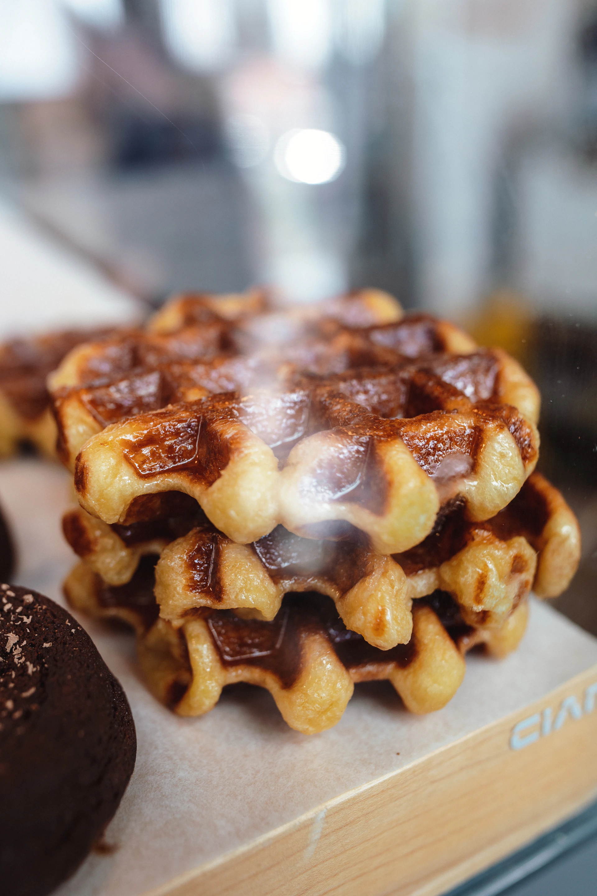 a stack of waffles sitting on top of a counter
