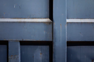 Close-up of industrial aluminum surface being cleaned with chemical agent