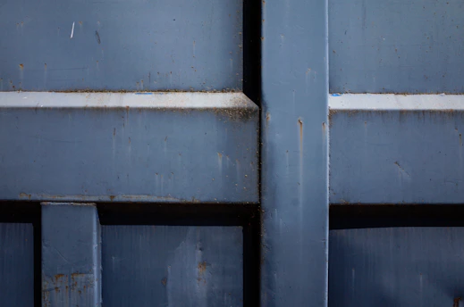 Close-up of industrial aluminum surface being cleaned with chemical agent