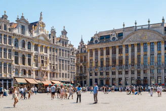 a group of people standing in front of a building