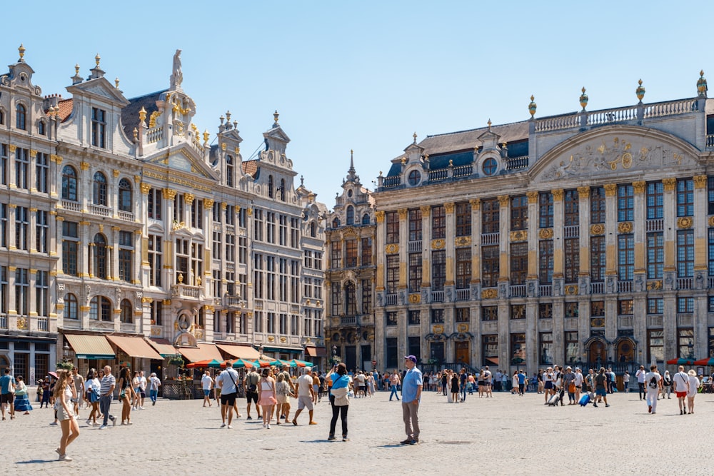 a group of people standing in front of a building