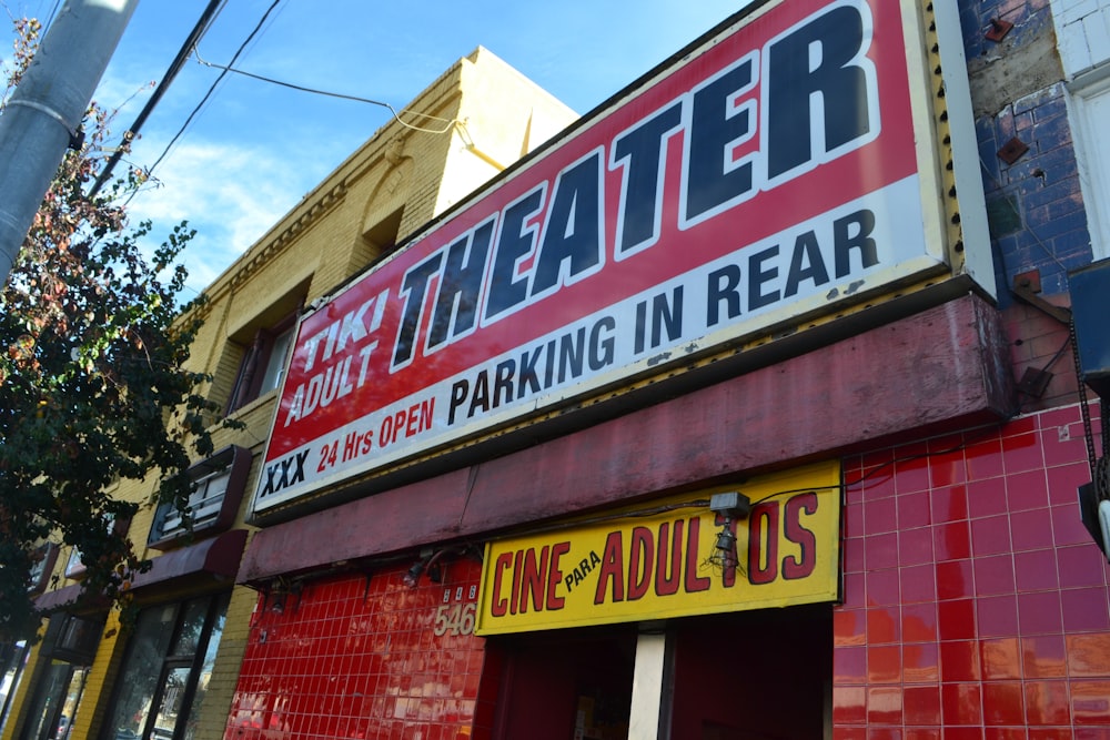 a theater sign on the side of a building