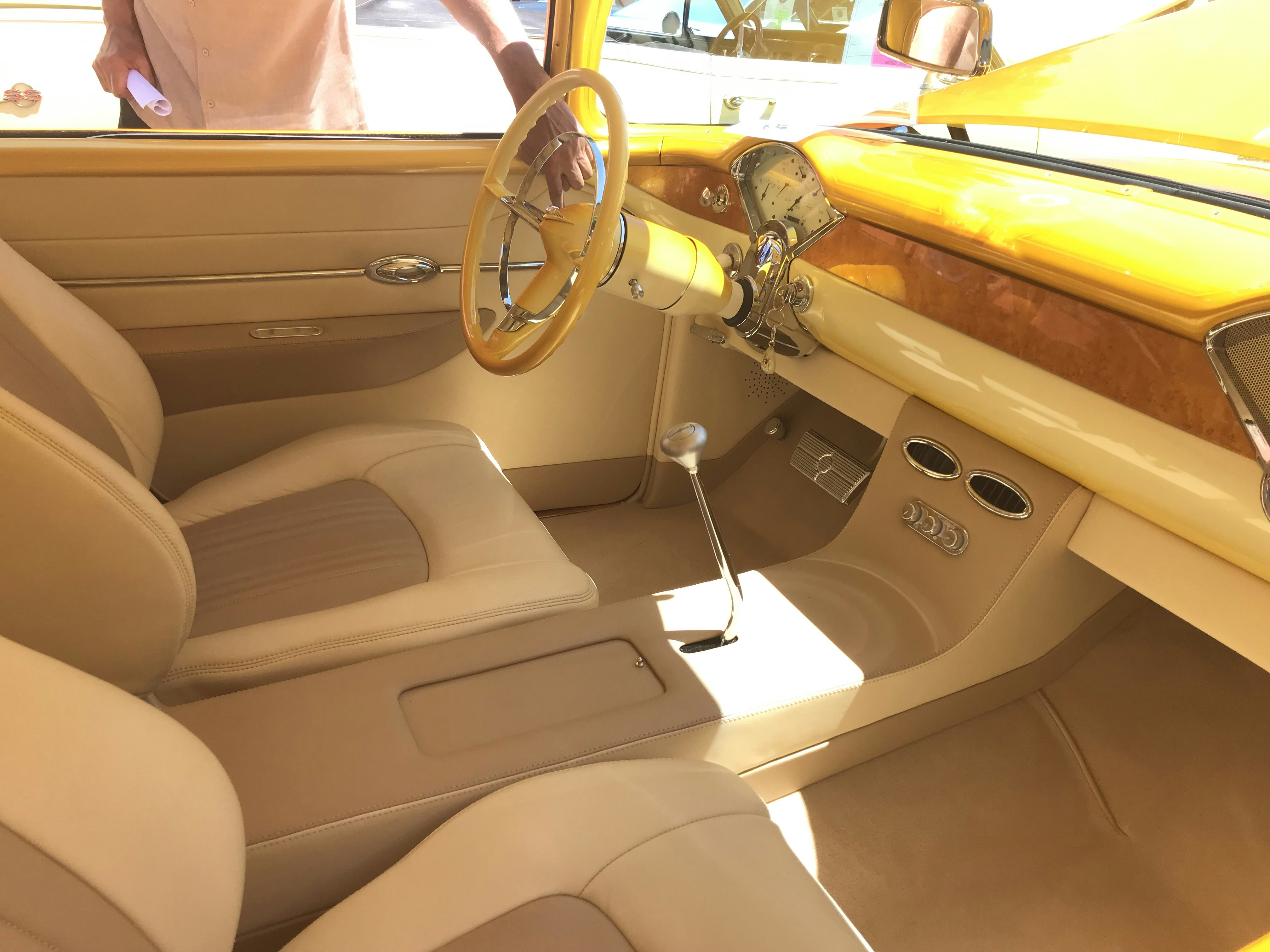 the interior of a car with a steering wheel