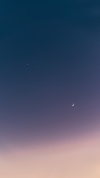 A serene celestial chart glowing softly against a deep blue background.