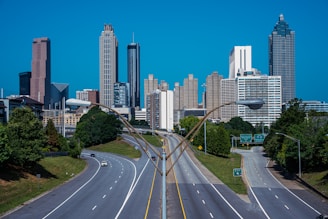 a view of a city skyline from a highway