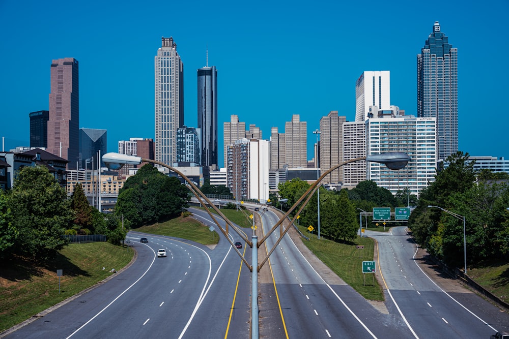 a view of a city skyline from a highway