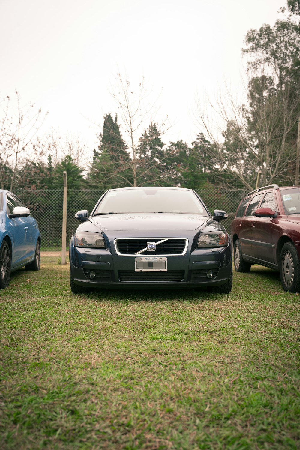 a couple of cars parked next to each other