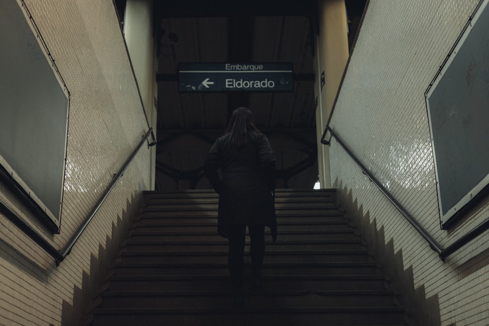 a person walking down a flight of stairs