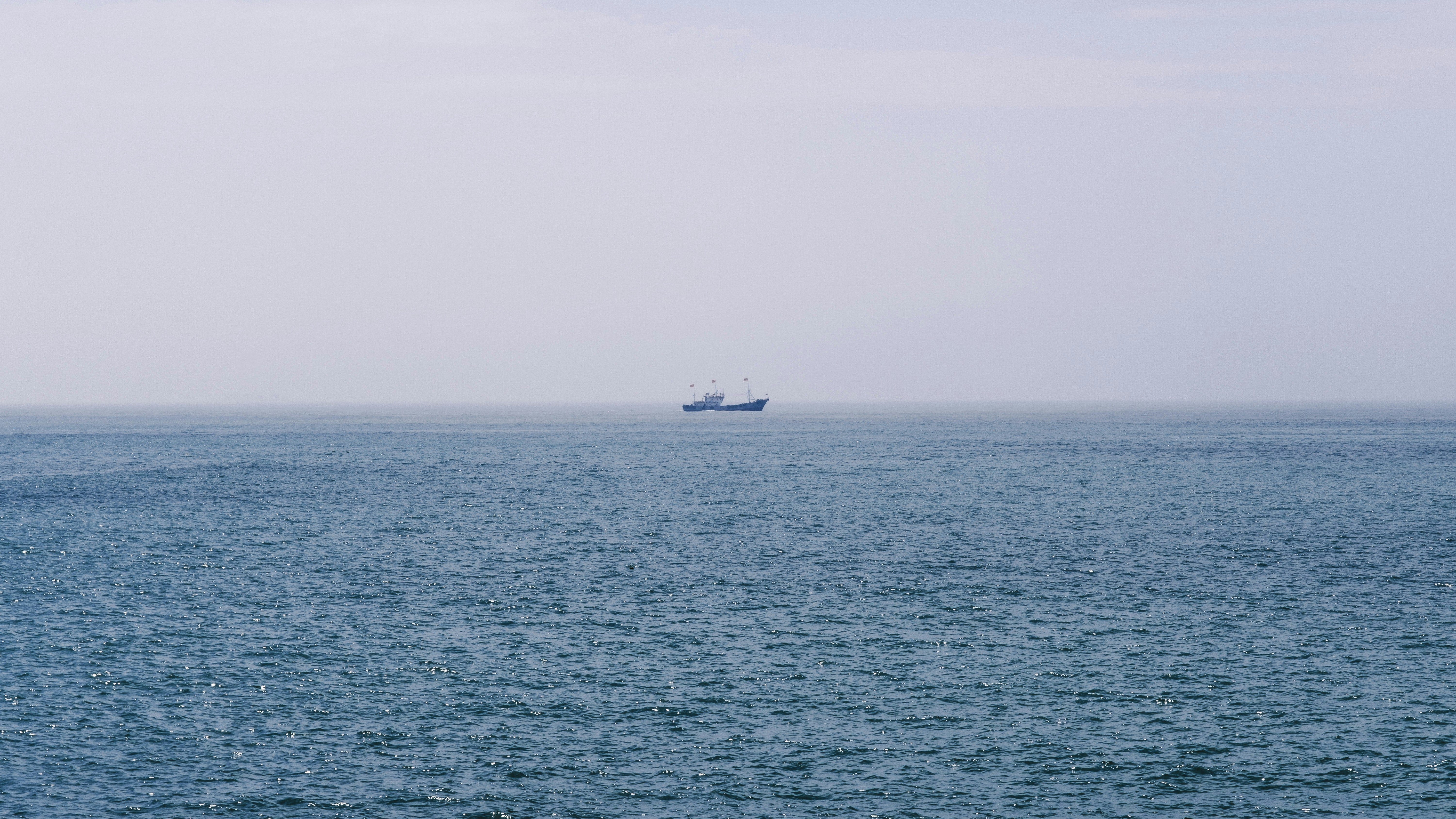 a large ship in the middle of the ocean