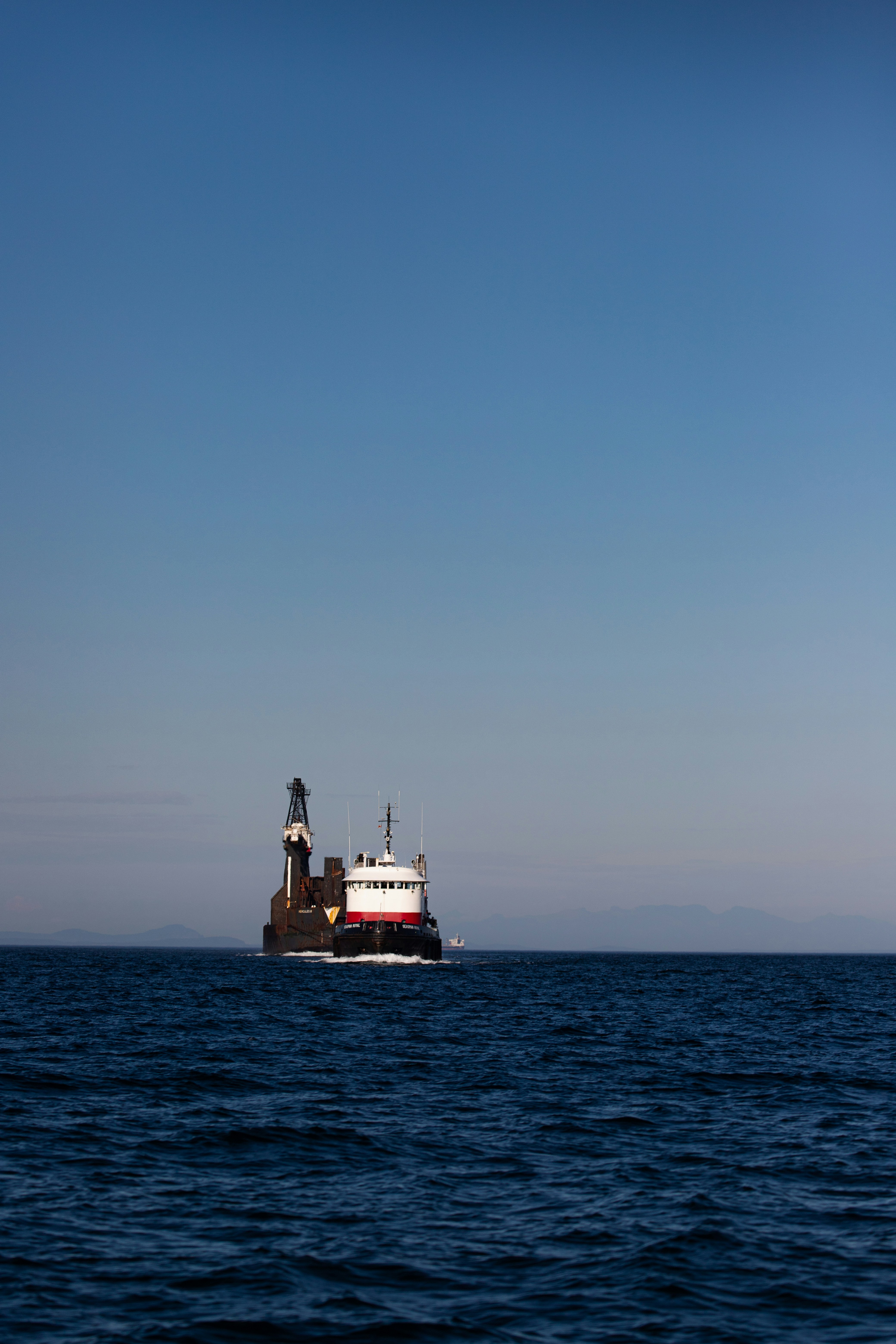 a large boat floating on top of a large body of water