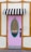 A pastel pink door with an oval-shaped window and turquoise trim is set into a cream and wooden frame wall. Above the door hangs a black and white striped awning. The door has a silver handle and an electronic lock. The number 112 is displayed above the window.