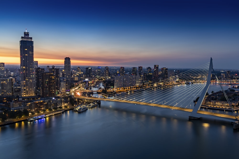 a view of a city and a bridge at night