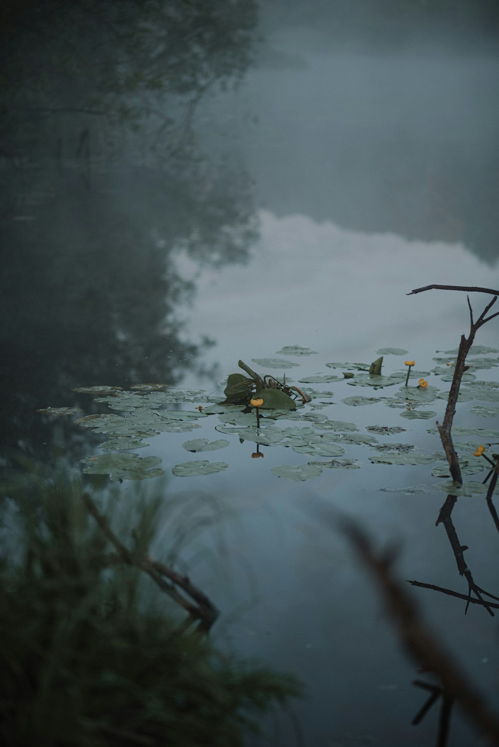 a small boat floating on top of a body of water