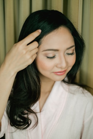 A serene virtual therapy session showing a woman feeling supported and understood on her screen.