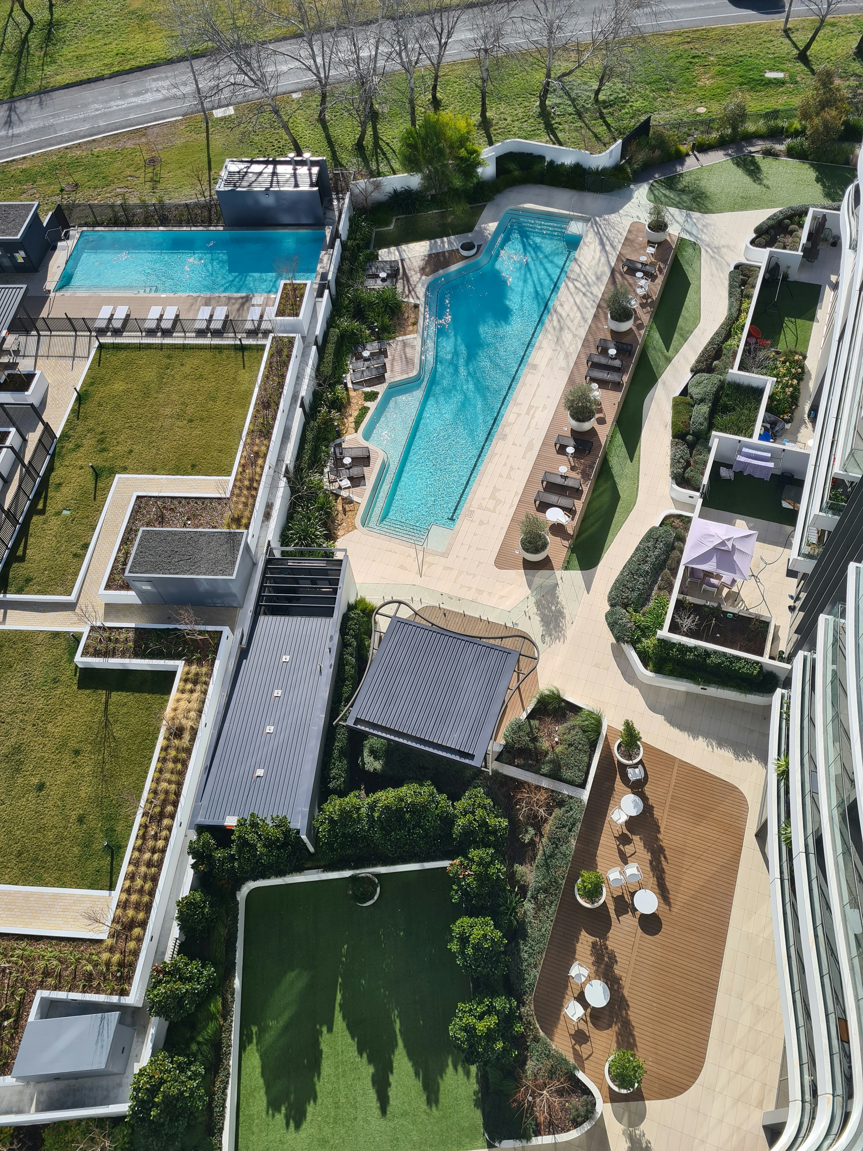 Well-maintained apartment complex with modern amenities and green spaces