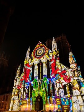 a large cathedral lit up with colorful lights