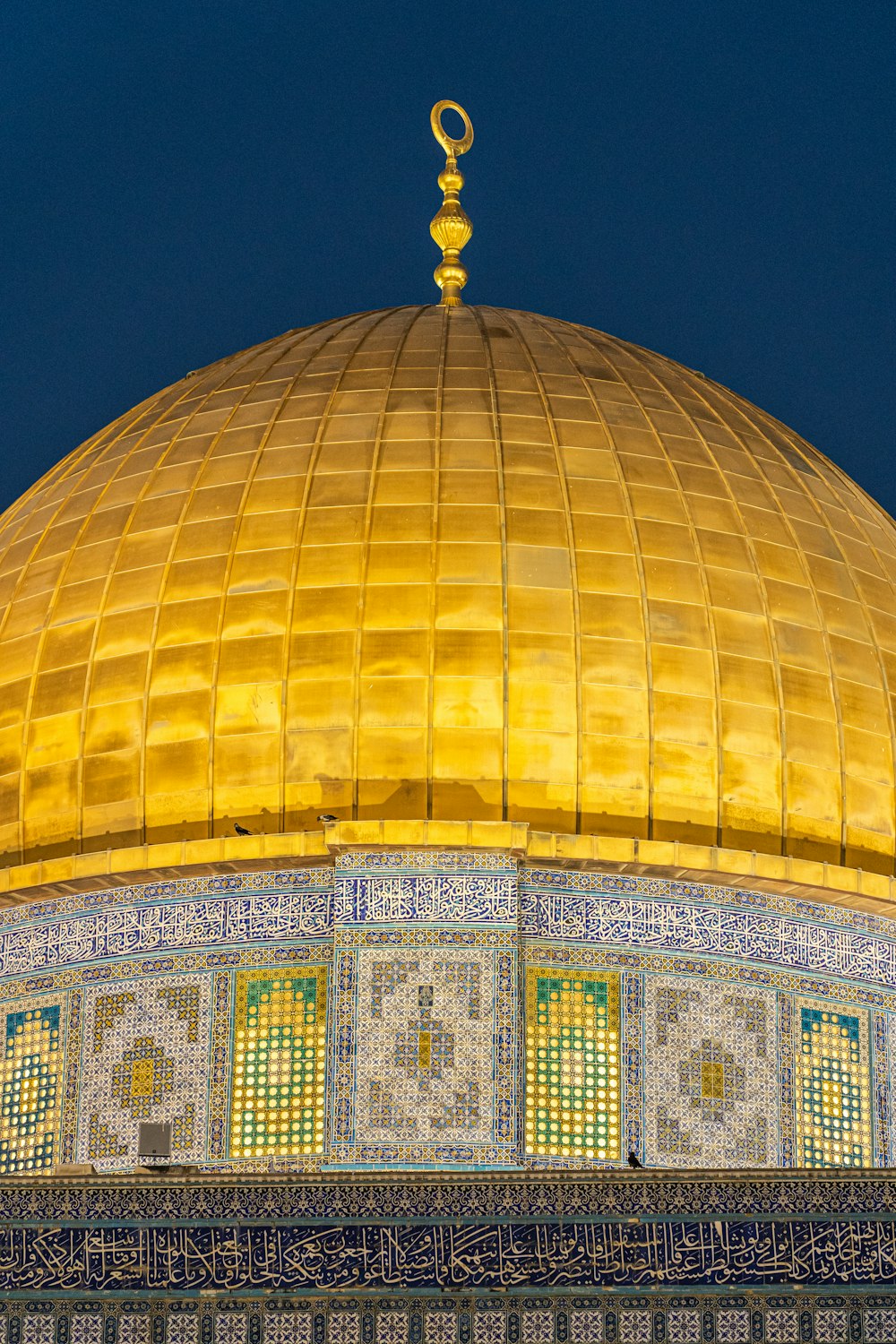 the dome of a building lit up at night