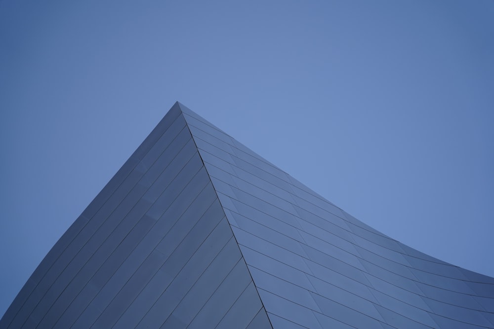 a very tall building with a sky in the background