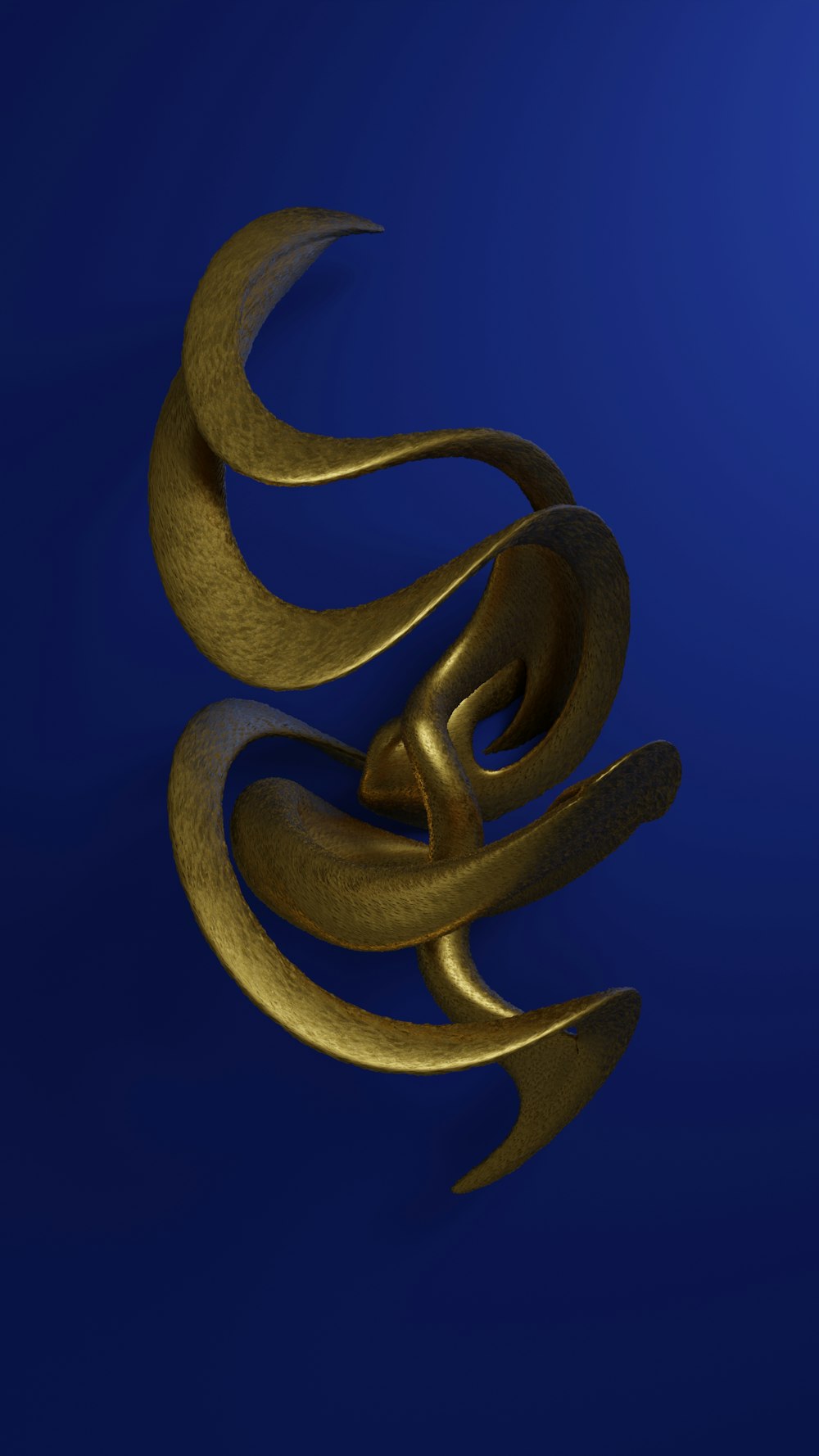 a gold object is shown against a blue background