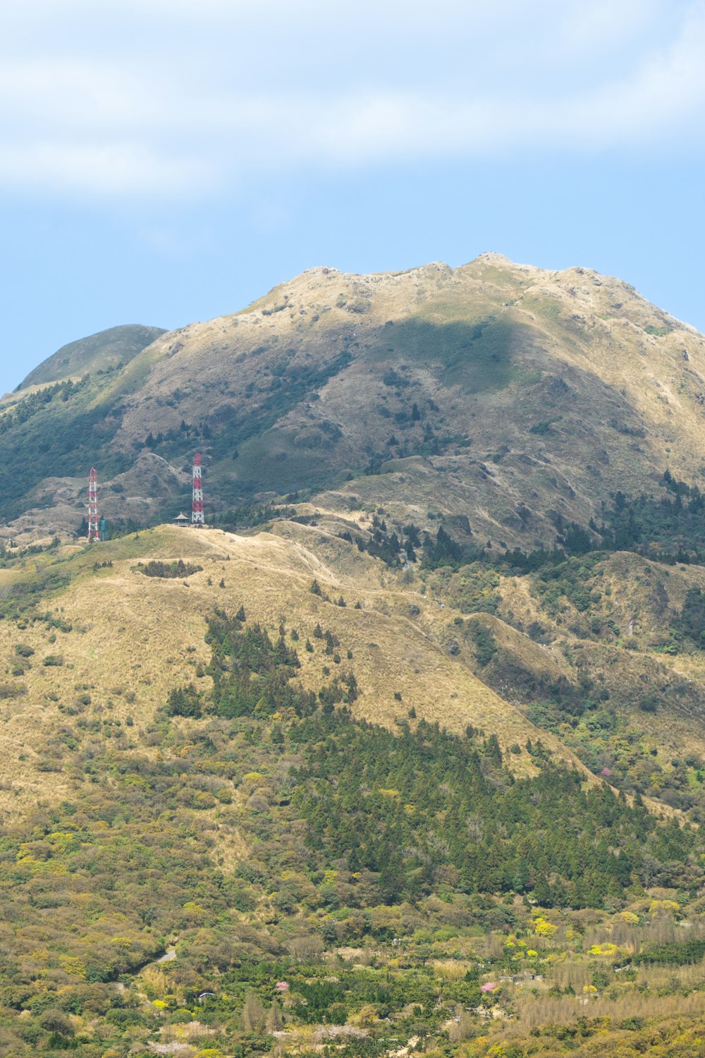 a hill with a tower on top of it