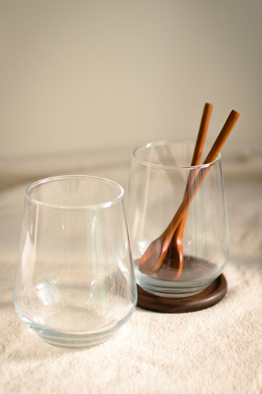 a couple of glasses sitting on top of a table