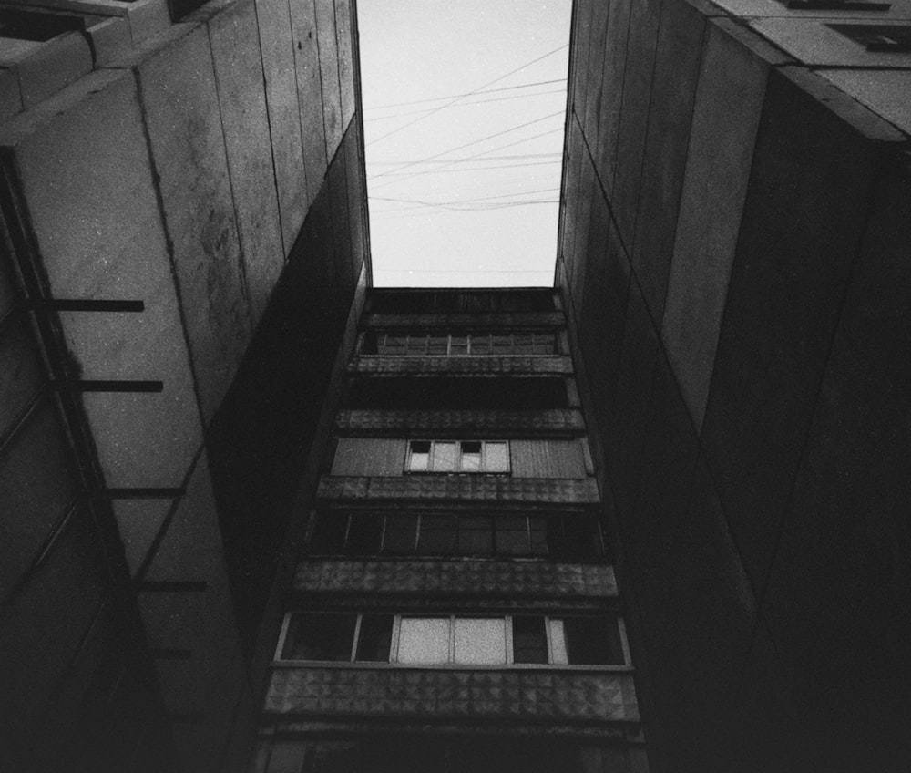 a black and white photo of a tall building