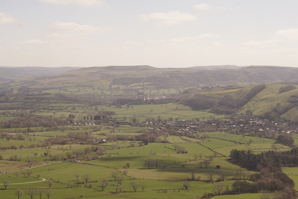 a view of the countryside from a hill