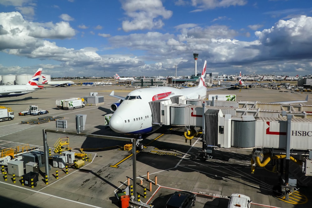 a large jetliner sitting on top of an airport tarmac