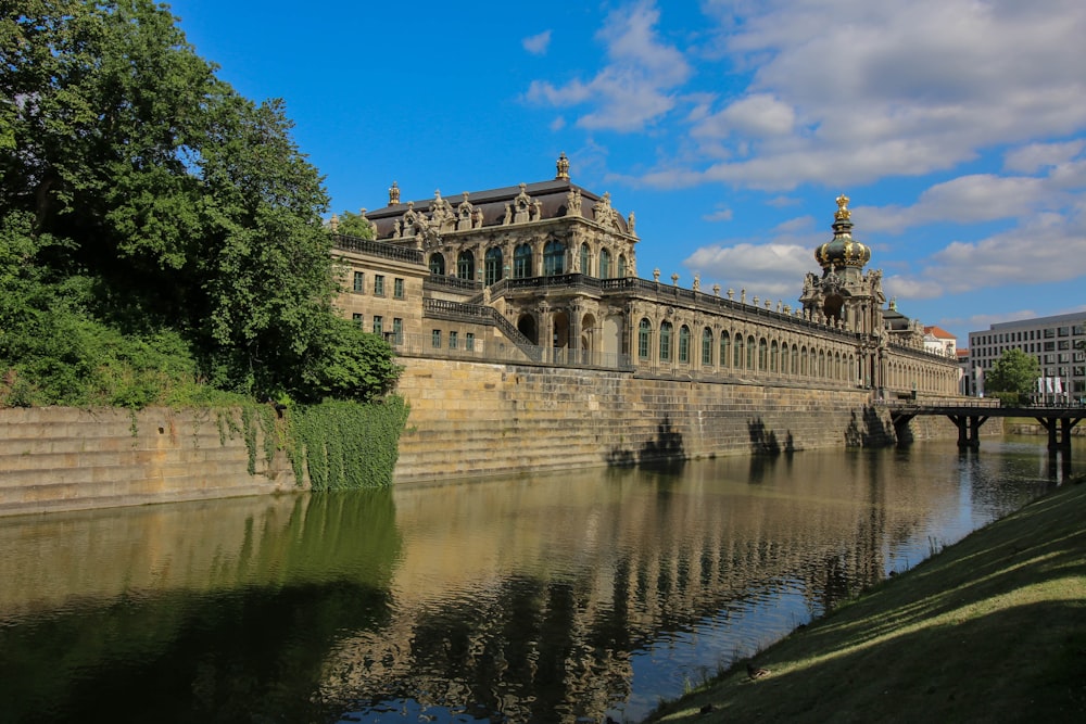 a large building next to a body of water