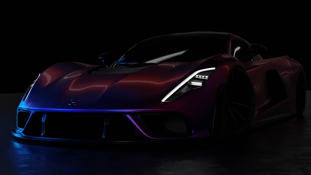 a red and blue sports car in a dark room