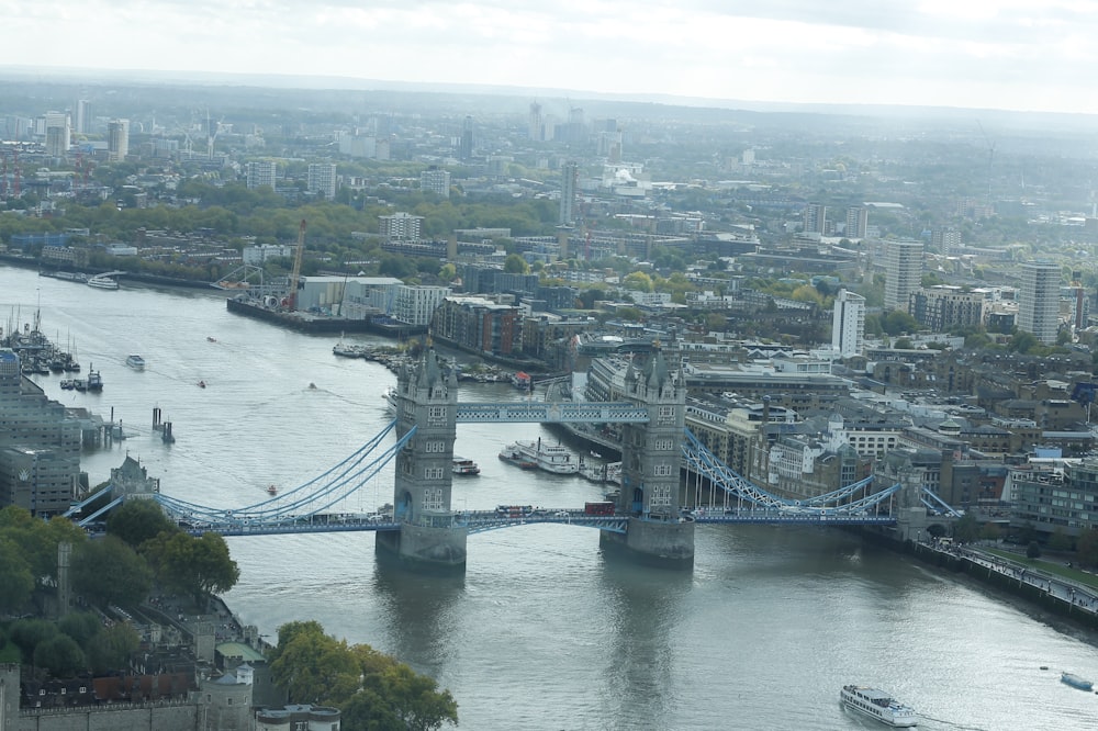 an aerial view of a city and a bridge