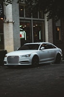 A sleek modern sedan parked in an urban setting.