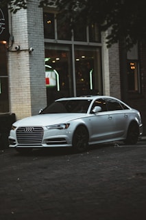 A sleek sedan parked in an urban setting.