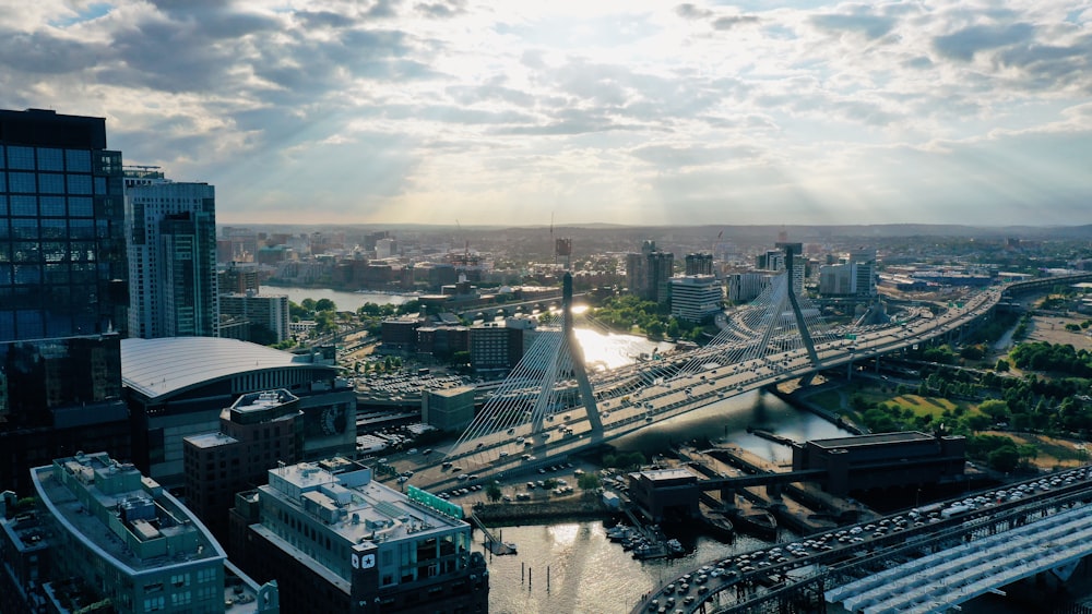 a view of a city with a bridge and a river