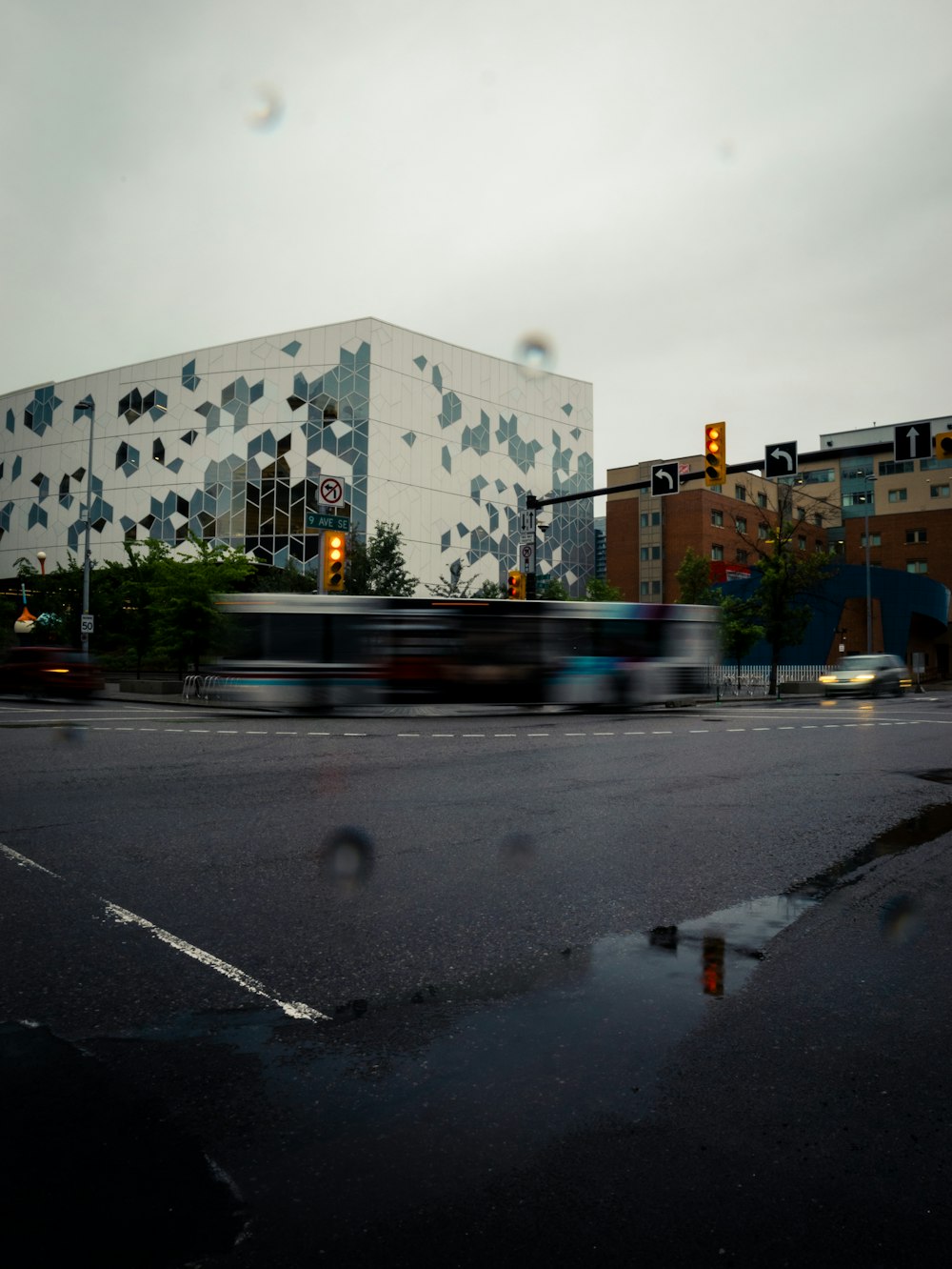 a city street with a traffic light and a building