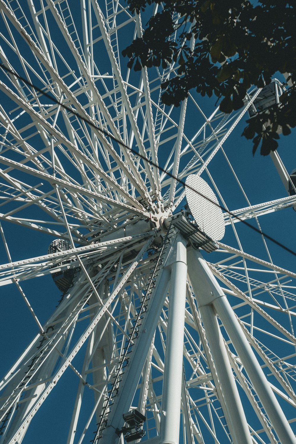 a ferris wheel with a blue sky in the background