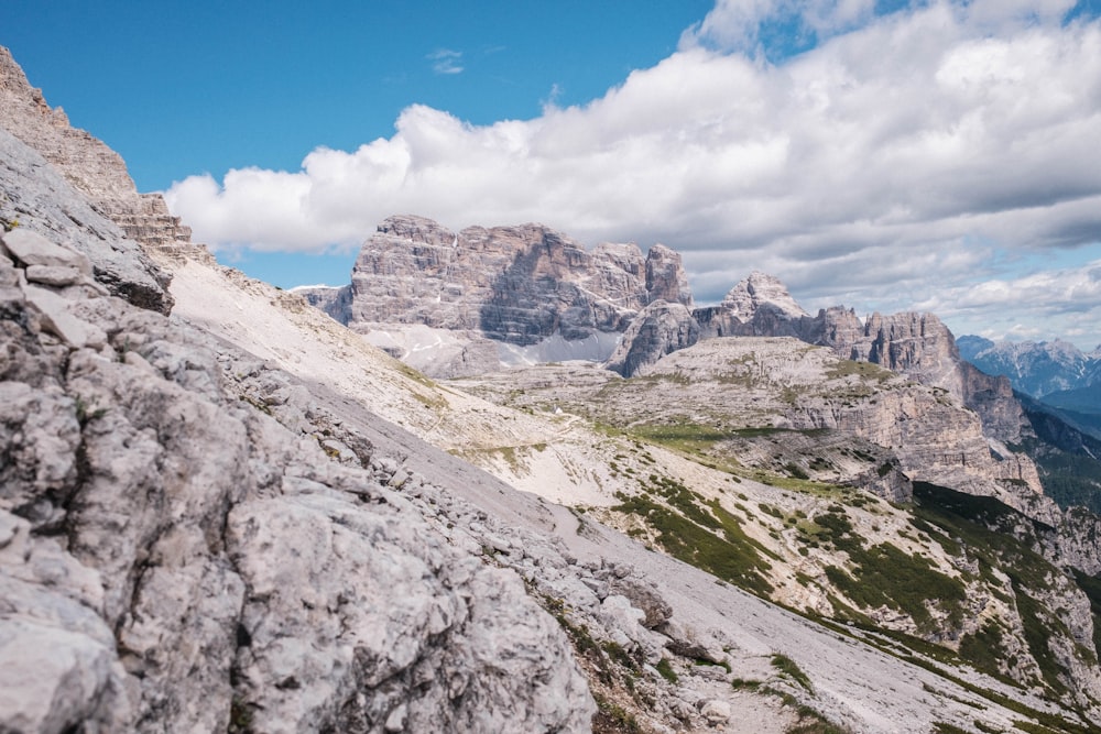 a view of a mountain range from the top of a mountain